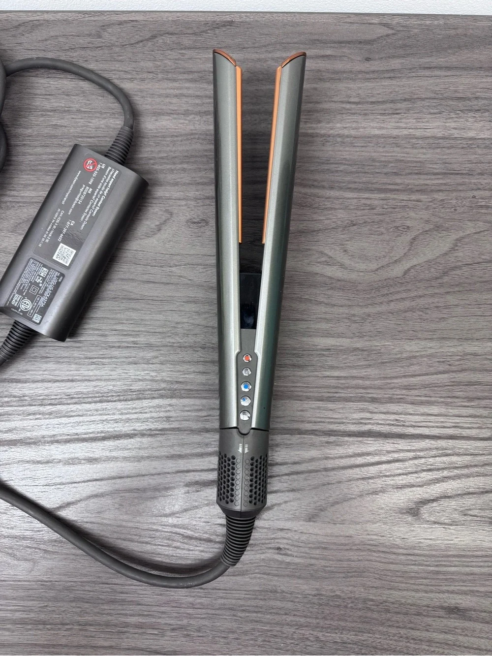 Dyson straightener in silver and copper accents